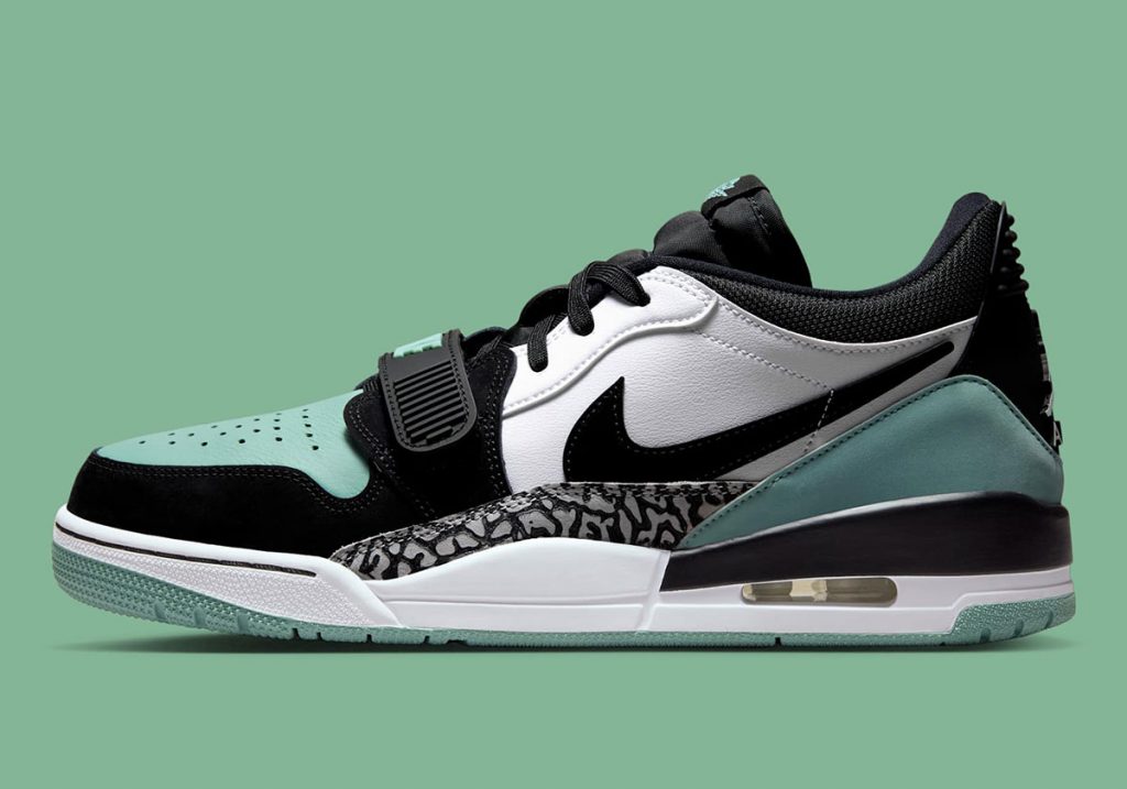 Du vert pastel se pose sur la Jordan Legacy 312 Low.